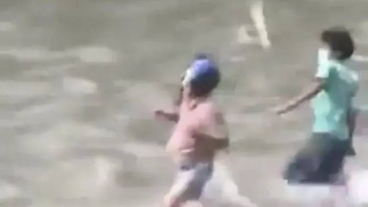 Shock moment Nepal’s minister is chased into river & PM quits as rioters burn down his house amid social media ban fury
