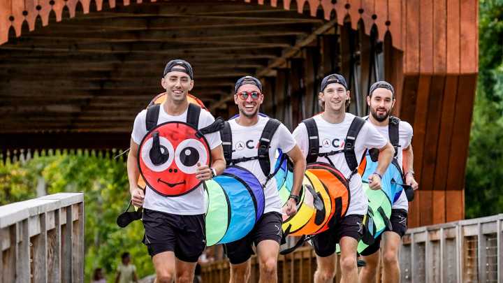 Friends dress as caterpillar to break record in Geist Half Marathon