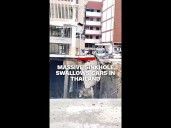 Massive sinkhole swallows cars in Thailand