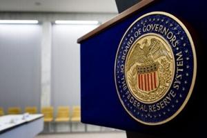 Stocks, dollar calm before expected US rate cut