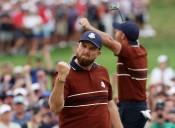 Ryder Cup day two: Rory McIlroy and Shane Lowry win fourball match as Europe stretch lead over USA