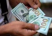 El dólar oficial quedó a menos de $ 7 del techo de la banda y en el Banco Nación llegó $ 1.475