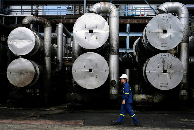 Exclusive-Vitol and Glencore set to make formal bids for Chevron's Singapore refinery stake, sources say