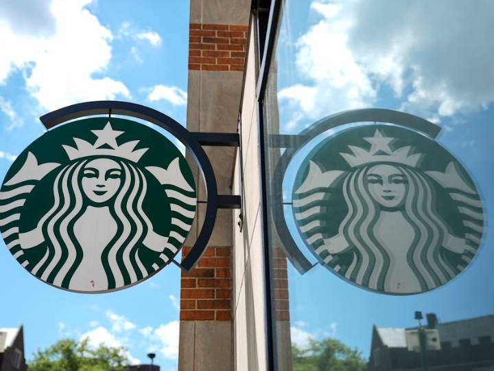 Starbucks to close hundreds of stores, lay off 900 workers as part of turnaround plan