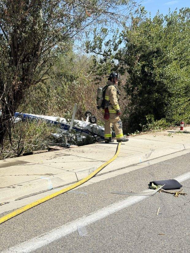 Plane crashes near California airport and sparks fire