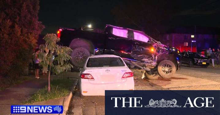 SUV smashes into parked cars, lands on Toyota Corolla on Sydney street