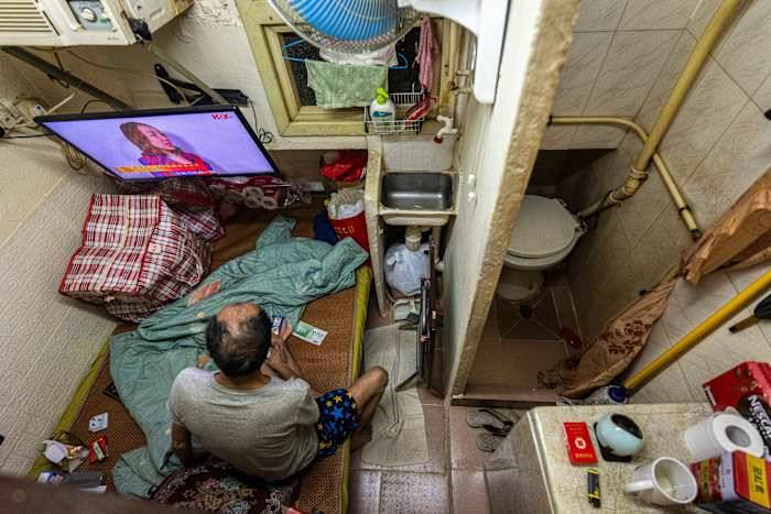Hong Kong lawmakers pass bill to ban substandard tiny apartments