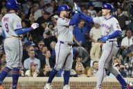 Mets top Cubs to maintain slim lead in battle for final NL wild