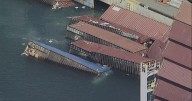 More than 60 containers fall off ship in Long Beach port