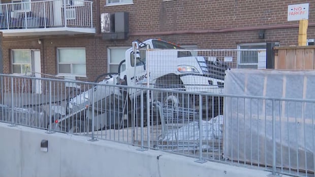 Sanitation truck saved after falling into sinkhole in Toronto