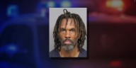 Man arrested after swinging ‘axe-like object’ at Lincoln bus stop, police say