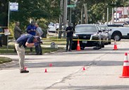 ICE officer fatally shoots suspect after being dragged by car near Chicago, officials say