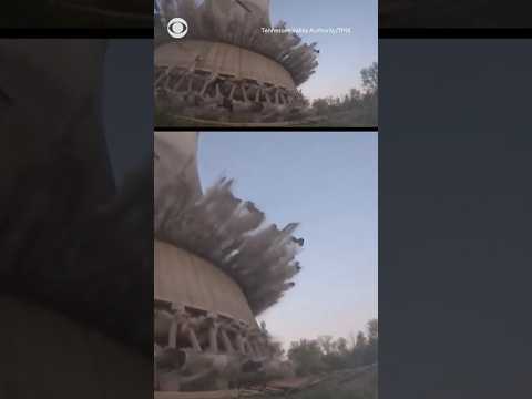 Tennessee nuclear cooling tower crashes down in controlled implosion #shorts