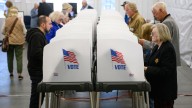 Justice Department sues six more states in push for voter data