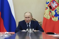 Putin says Russia will stick to nuclear arms limits for 1 more year