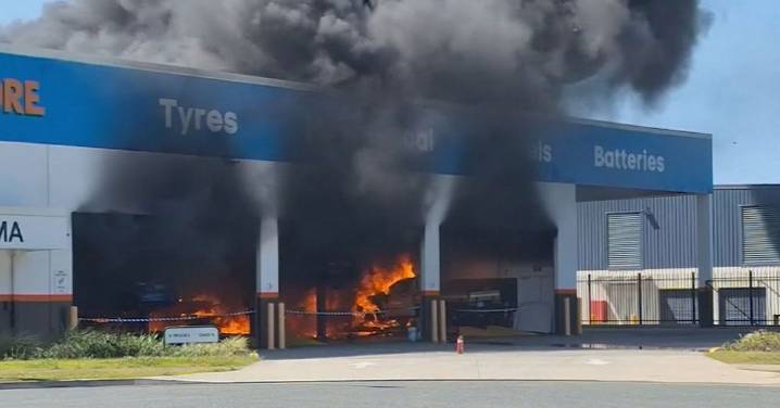 Man fighting for life after fire breaks out at Queensland tyre shop