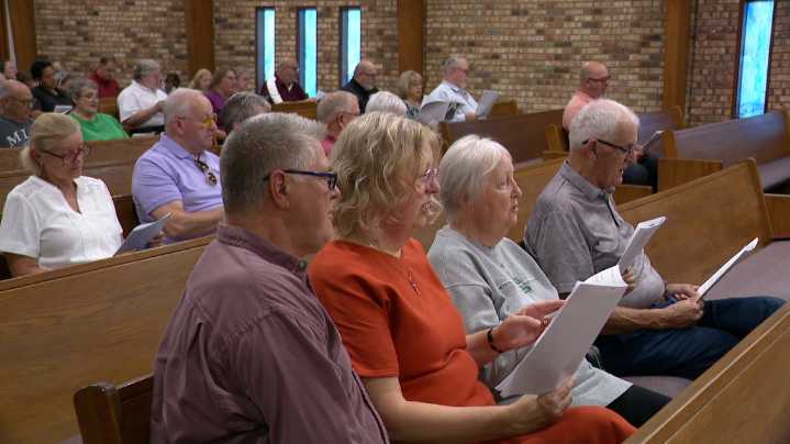 Community gathers for prayer, song after deadly church shooting in Grand Blanc Township