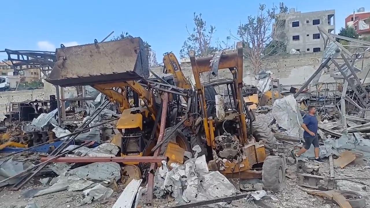 Locals inspect site where Israeli strikes hit equipment intended for reconstruction in south Lebanon