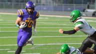 Watertown's Lincoln Schutt makes his way into the end zone
