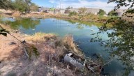 Agua de drenaje se acumula en dique de El Mezquital, afirman vecinos