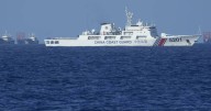 China's military warns Philippines on South China Sea