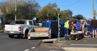 Two-vehicle crash outside primary school sees one person suffer multiple injuries