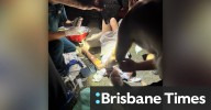 Man charged over alleged axe attack on neighbours