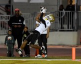 Long Beach Poly football holds off Lakewood