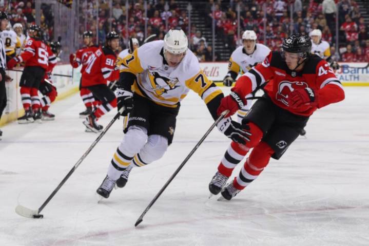 NHL Rumors: Mario Ferraro, Luke Hughes, and Evgeni Malkin