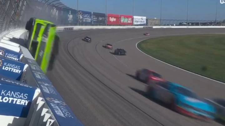 Terrifying moment NASCAR driver slams into and slides along barrier at 200mph before flipping as horrified fans watch on