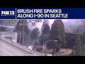 Brush fire sparks along I-90 in Seattle, WA