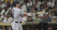 Rookie Crim homers for his 1st MLB hit as the Rockies beat the Padres 4