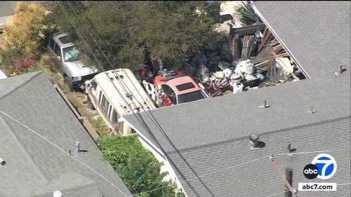 Mounds of clutter outside Huntington Beach home creates eyesore for neighborhood, over 39 complaints filed by neighbors