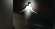 Watch naked man stride down busy road in pitch black as woman describes her 'terror'