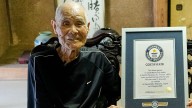 Mount Fuji's summit is reached by 102-year-old man who breaks record for oldest climber