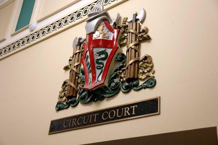 Superior woman allegedly stabbed man with a chisel