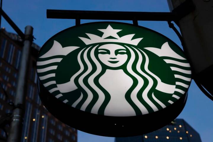 Starbucks to close hundreds of stores, lay off 900 workers as part of turnaround plan