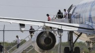 As Guatemalan kids sit in planes on tarmac, judge orders they stay in the US, for now