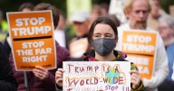 Anti-Donald Trump rally in Edinburgh with creative signs and orange facepaint