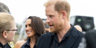 Meghan Markle Wears Backless Navy Polo Dress to Event With Prince Harry