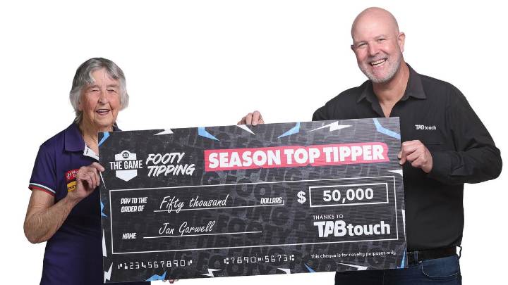 The Game: Fremantle Dockers supporter Jan Garwell takes home $50,000 as top tipper, thanks to TABtouch