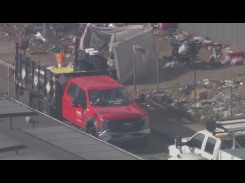 Crews clear South LA homeless encampment