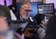 Wall Street coasts toward the finish of its best week in the last 5