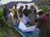 Afghans displaced by quake live on streets, in farm fields as winter looms