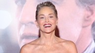 Swimsuit-clad Sharon Stone showcases endlessly long legs in stunning waterside photo