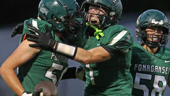 Photos of Cranston East vs Ponaganset football on Friday September 26