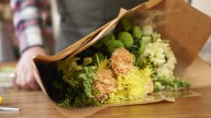 Add A Wine Glass To Your Flower Arrangements To Create An Illuminating Display
