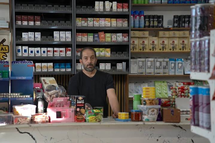 Anas Samir, 42, is shown in the shop he runs in Al-Eizariya. Last month, he and dozens of other shopkeepers and business owners were notified that demolition orders would soon be enforced, as Israel a