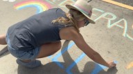 People in St. Pete protest street mural