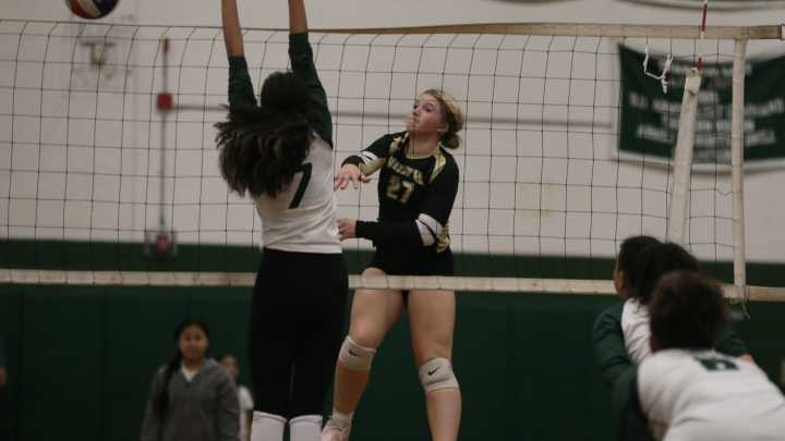 Photos of North Kingstown girls volleyball and Cranston East